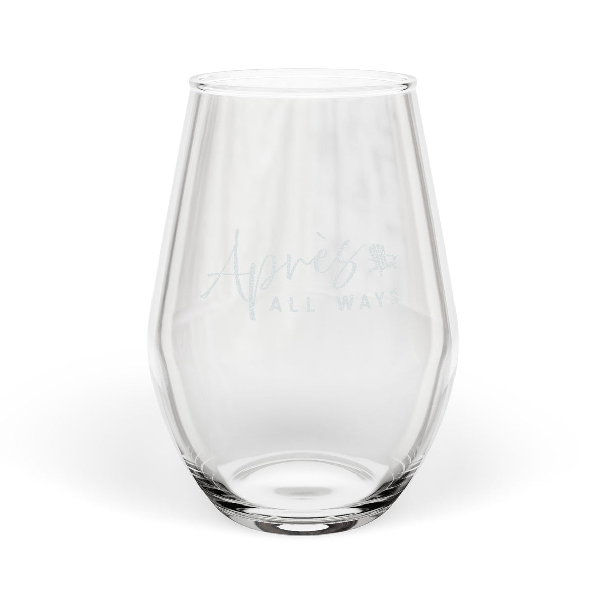Empty clear stemless wine glass featuring the Après All Ways logo and Adirondack chair icon on a white background.