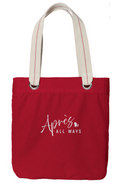 Sangria red Après All Ways tote bag with cream handles, silver-tone grommets, and a white logo with an Adirondack chair icon on the front.